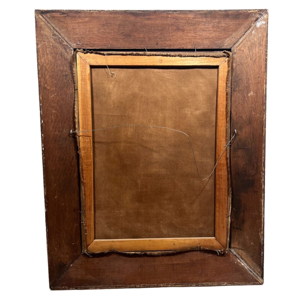 the back of a 18th century spanish colonial painting with gilded frame